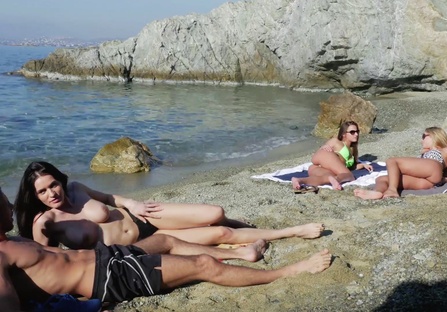 Aphrodite with a stranger couple at the beach